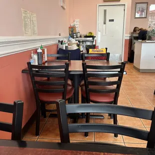 a table and chairs in a restaurant