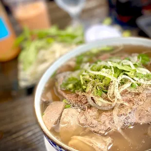 $21 Pho (with $6 Thai tea in the background)