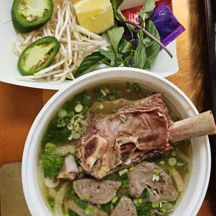 Pho Rose: Pho Dac Biet Special #1 with 1 rib bone, meatballs and rare steak, $16. Recommended!