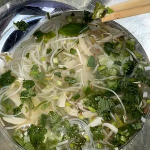Clear, watered down broth with wilted basil