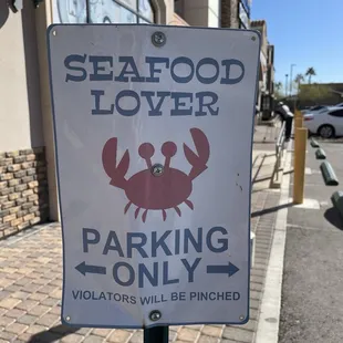 Cute sign, but why in front of a Vietnamese restaurant and an eyeglasses store??