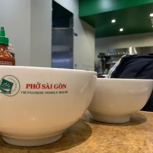 Large and small bowl of pho