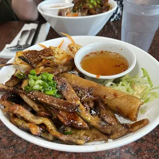 42. Rice Vermicelli W/ Grilled Lemongrass Pork Shrimp & Eggrolls