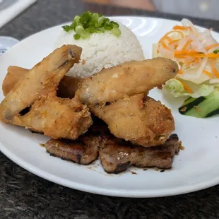 #43: Grilled pork chop, fried chicken wings, &amp; egg roll over rice