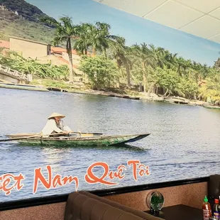 a man in a boat on the river