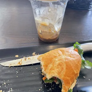 Pork bahn mi and iced Vietnamese coffee.