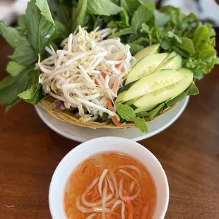 a bowl of soup and a bowl of salad