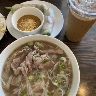 Summer roll with pork and shrimp + Pho with tendon and raw beef + Vietnamese iced coffee