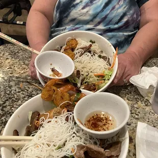 64. Charbroiled Pork Chop, Egg Roll, Shrimp with vermicelli