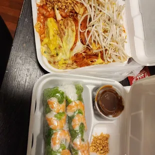 a variety of food in a styrofoam container