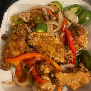Salt and pepper chicken wings with vegetables