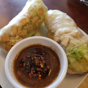 Veggie spring rolls chili oil in the peanut sauce