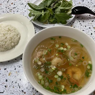 Shrimp soup with a base pho broth, without most of the rice noodles added to it.