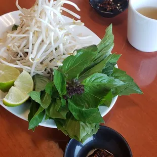 BEAN SPROUTS, THAI BASIL, LIME AND SA TÊ CHILI SAUCE [IN SMALL DISH]