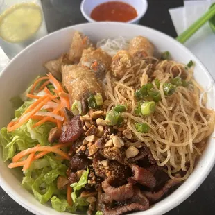 40. Rice Vermicelli with Shredded Pork Skin, Grilled Pork Strips and Eggrolls