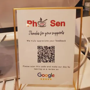 a sign with a qr code on it
