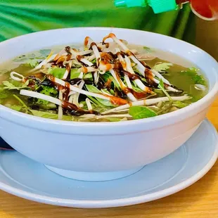 a bowl of soup on a plate