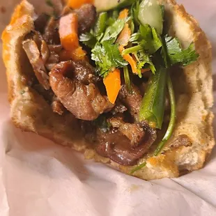 Inside view of the pork banh mi sandwich - $6