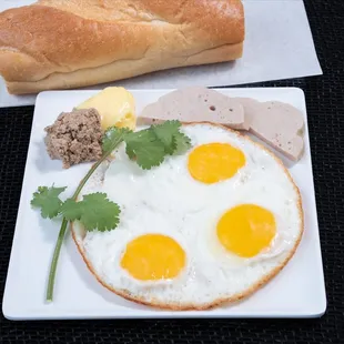 Sunny Side Eggs &amp; Pork Rolls with Bread
Bánh Mì Ốp La