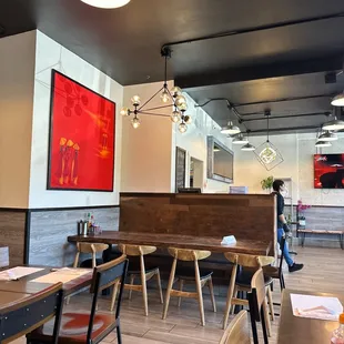 a woman walking through a restaurant