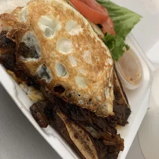 Marinated beef 16. Grilled Beef Short Ribs with Fried Egg Plate. Not enough beef short ribs and way too much rice. But still good