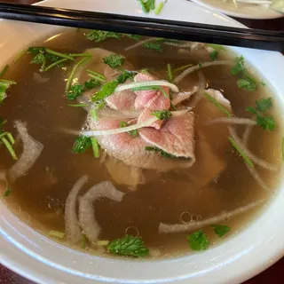 10. Rare Slices of Steak and Brisket Rice Noodle Soup