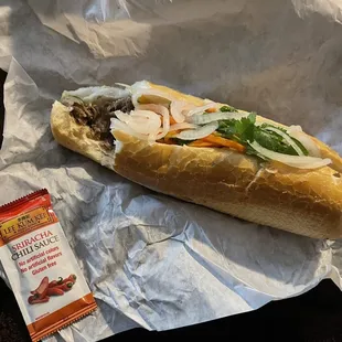 a sub sandwich on a piece of paper