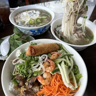 a bowl of noodles, meat, and vegetables