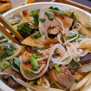 P8. Welldone Steak Pho mixed with the added toppings