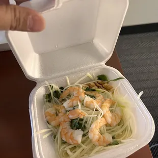 Papaya Salad ... soggy and sour fish sauce.  Not authentic to Vietnamese