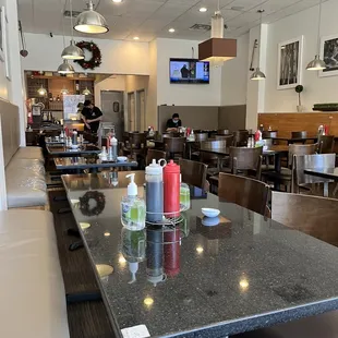 a restaurant with tables and chairs