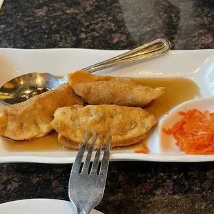 Potstickers with one missing because they were too good to wait for a picture