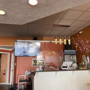 a view of a restaurant counter