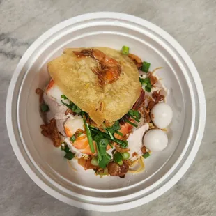Mì Anh Đào: Yellow egg noodles, prawns, pork, quail eggs. Take out.