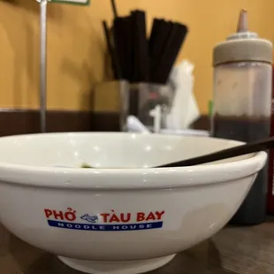 a bowl of soup with a spoon in it