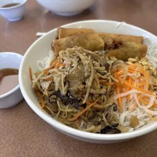 42. Vegetarian Shredded Tofu, Mushroom, Carrot, and Egg Rolls over Vermicelli