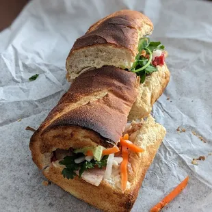 a sandwich on a piece of paper