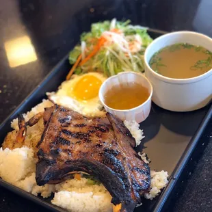 Grilled Beef Ribs with rice, shrimp and fried egg