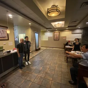 The owner taking picture with my brother