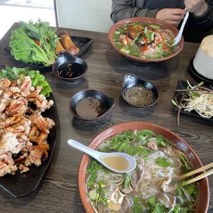 A1. Fried Garlic Calamari P1. Pho Special Combination Whole Coconut Juice fried A7. Vietnamese Egg Rolls