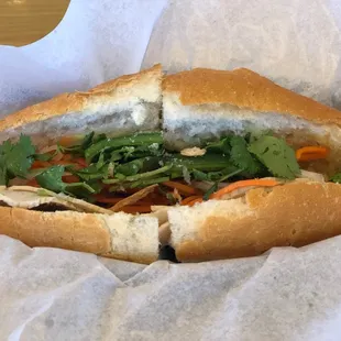 My favorite banh mi! I can eat this everyday. Banh Mi Xiu Mai Cha Lua - Pork meatballs and pork roll