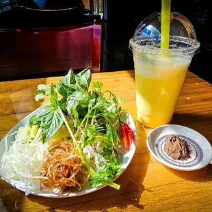 Veggies for bun bo hue with side of shrimp paste and egg soda