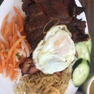 #409 The combination of grilled pork, grilled chicken, grilled pork chop, shredded pork skin and fried egg
