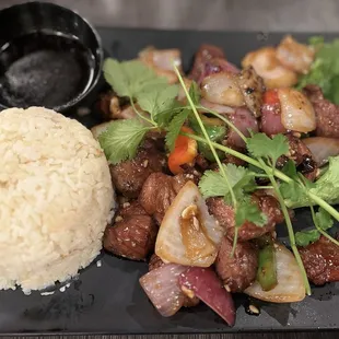 Shaking beef with rice