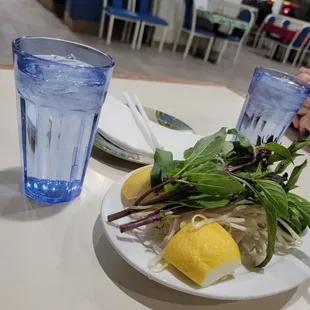 a plate of food and a glass of water