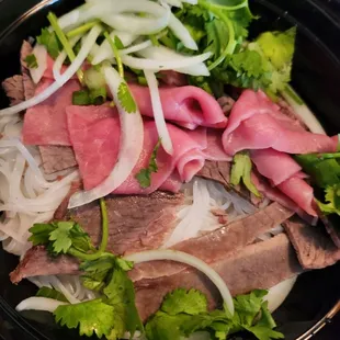Beef noodle $17.49 featuring thinly sliced medium-rare steak; "with steamed lean beef; combining steamed half-leanhalf-fatty 9/18/24