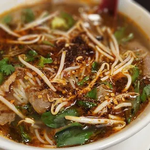 a bowl of pho tommy soup