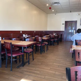 a man sitting at a table in a restaurant