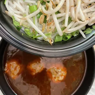 a bowl of soup and a bowl of meatballs