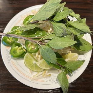 Thai basil, bean sprouts, lime, and jalapeño